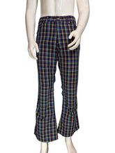 Load image into Gallery viewer, Plaid flared pants against a white background.
