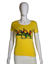 Load image into Gallery viewer, Yellow top with floral design on a mannequin against a plain background
