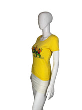 Load image into Gallery viewer, Mannequin wearing a yellow shirt with a design on a white background
