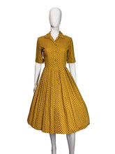 Load image into Gallery viewer, Yellow textured dress on a mannequin against a white background
