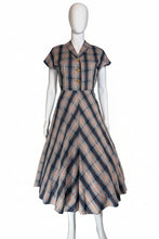 Load image into Gallery viewer, Plaid dress on a mannequin against a plain wall
