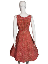 Load image into Gallery viewer, Red textured dress on a white mannequin against a plain background
