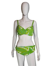 Load image into Gallery viewer, Mannequin wearing green and white patterned underwear on a gray background
