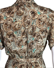 Load image into Gallery viewer, Close-up of a textured fabric with intricate patterns on a neutral background
