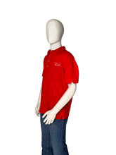 Load image into Gallery viewer, Mannequin wearing a red shirt and blue jeans on a white background
