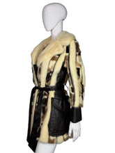Load image into Gallery viewer, Mannequin wearing a patterned coat on a plain background
