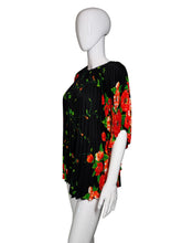 Load image into Gallery viewer, Black dress with red floral pattern on a mannequin 
