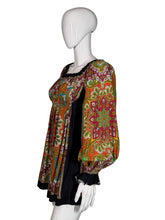 Load image into Gallery viewer, Colorful patterned dress on a mannequin against a plain background
