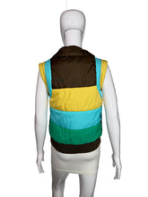 Load image into Gallery viewer, Mannequin wearing a colorful striped puffer vest on a plain background
