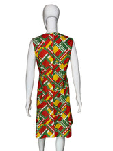 Load image into Gallery viewer, Mannequin wearing a colorful geometric-patterned dress against a plain background
