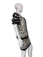 Load image into Gallery viewer, Black and white patterned garment on a mannequin against a plain background

