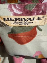 Load image into Gallery viewer, Fabric with floral pattern and 'Merivale' brand label.
