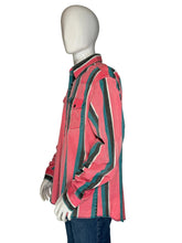 Load image into Gallery viewer, Mannequin wearing a pink and green striped garment 
