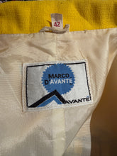 Load image into Gallery viewer, Close-up of a Marco Davante label on a beige fabric background
