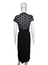 Load image into Gallery viewer, Black dress with butterfly pattern on a mannequin

