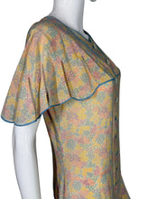 Load image into Gallery viewer, Floral dress on a mannequin against a plain background
