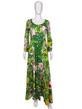 Load image into Gallery viewer, Green floral Jumpsuit on a mannequin against a white wall
