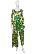 Load image into Gallery viewer, Green floral Jumpsuit on a mannequin against a white wall
