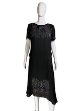 Load image into Gallery viewer, Black dress with intricate beading on a mannequin against a plain background
