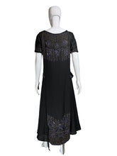 Load image into Gallery viewer, Black dress with intricate detailing on a mannequin against a neutral background
