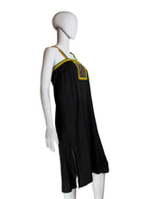 Load image into Gallery viewer, Black dress on  a mannequin against a white wall.
