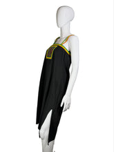 Load image into Gallery viewer, Mannequin wearing a black outfit with green and yellow accents on a white surface.
