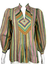 Load image into Gallery viewer, Multicolored striped shirt on a mannequin 
