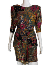 Load image into Gallery viewer, Mannequin wearing a patterned dress with a neutral background.
