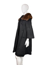 Load image into Gallery viewer, Mannequin wearing a dark coat with fur trim on a plain background
