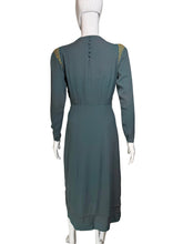 Load image into Gallery viewer, Teal dress on a mannequin against a plain wall.
