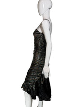 Load image into Gallery viewer, Mannequin wearing a black dress against a white wall.
