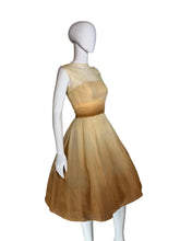 Load image into Gallery viewer, Mannequin wearing a beige dress on a white background.

