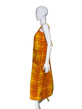Load image into Gallery viewer, Mannequin wearing an orange and yellow patterned dress on a white background.
