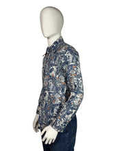 Load image into Gallery viewer, Mannequin wearing a patterned shirt on a plain background
