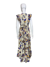 Load image into Gallery viewer, Floral dress on a mannequin against a white wall.
