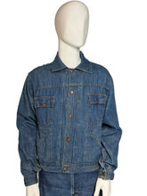 Load image into Gallery viewer, Blue denim jacket on a mannequin against a plain background
