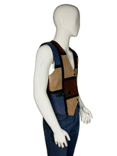 Load image into Gallery viewer, Mannequin wearing a patchwork vest with brown, blue, and beige colors on a plain background.
