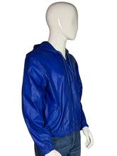 Load image into Gallery viewer, Blue jacket on a mannequin against a gray background
