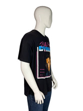 Load image into Gallery viewer, Mannequin wearing a black t-shirt with a graphic design on a plain background

