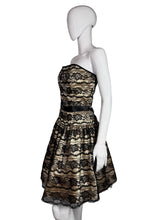 Load image into Gallery viewer, Black lace dress on a white mannequin against a white background
