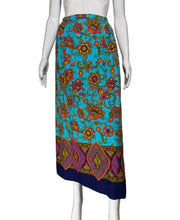 Load image into Gallery viewer, Mannequin wearing a colorful patterned skirt against a plain background
