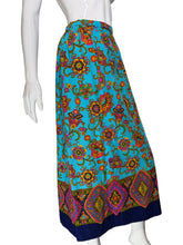 Load image into Gallery viewer, Mannequin wearing a colorful patterned skirt against a plain background
