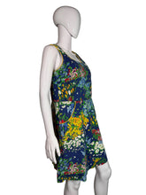 Load image into Gallery viewer, Mannequin wearing a colorful floral dress against a plain background
