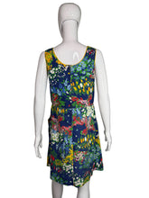 Load image into Gallery viewer, Mannequin wearing a colorful floral dress on a plain background
