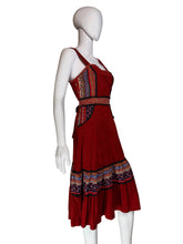 Load image into Gallery viewer, Red dress with patterned layers on a white mannequin against a plain background
