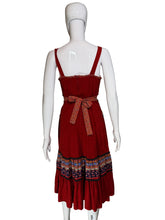 Load image into Gallery viewer, Red dress with patterned layers on a white mannequin against a plain background
