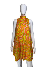 Load image into Gallery viewer, Mannequin wearing a colorful sleeveless dress with a pattern
