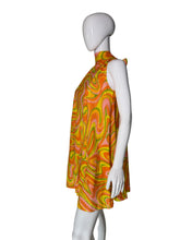 Load image into Gallery viewer, Mannequin wearing a colorful sleeveless dress with a pattern
