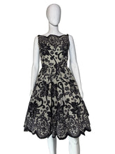 Load image into Gallery viewer, Black lace dress on a mannequin
