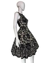 Load image into Gallery viewer, Black lace dress on a mannequin
